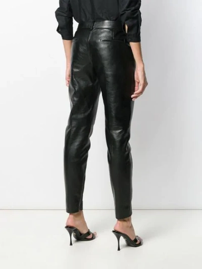 Shop Saint Laurent Mid-high Tapered Trousers In Black