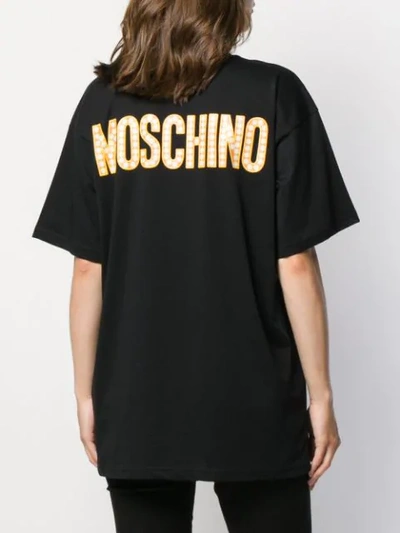 Shop Moschino Graphic Print Oversized T-shirt In Black