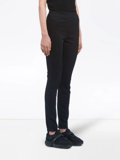 Shop Prada Side-zip Skinny Trousers In Black