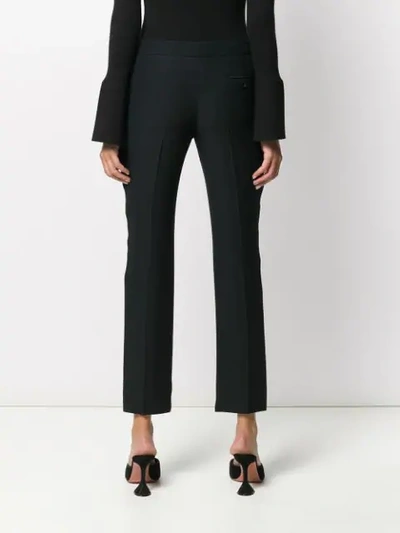 Shop Alexander Mcqueen Side Stripe Tailored Trousers In Black