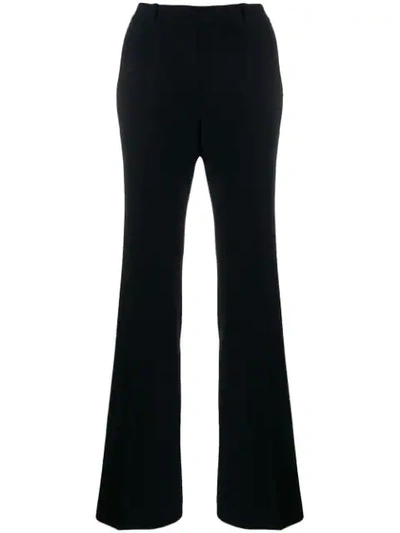 Shop Etro Flared Trousers In Black
