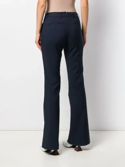 Shop Tonello Flared Style Trousers In Blue