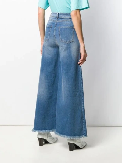 Shop Federica Tosi Faded Wide-leg Jeans In Blue
