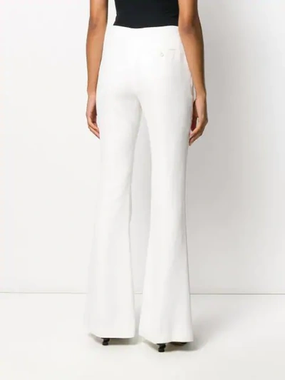 Shop Alexander Mcqueen Sharp Flared Trousers In White