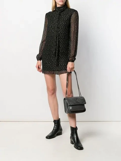 Shop Saint Laurent Star Print Mini Dress In Black