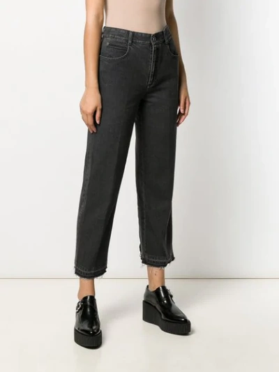 Shop Stella Mccartney Frayed Cropped Jeans In Black