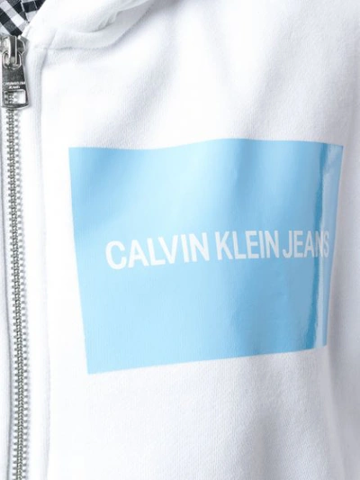 Shop Calvin Klein Jeans Est.1978 Calvin Klein Jeans Zipped Longsleeved Hoodie - White