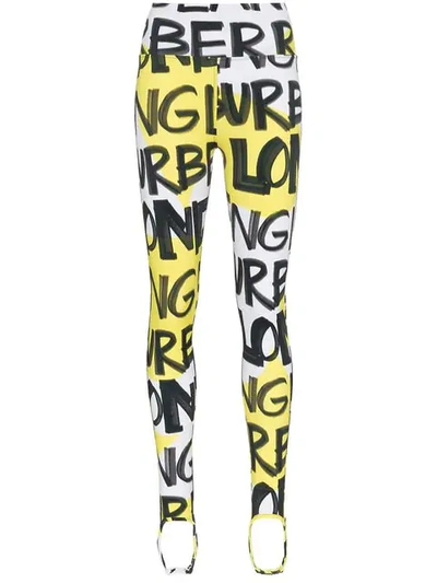 Shop Burberry Graffiti Logo Stirrup Leggings In Yellow