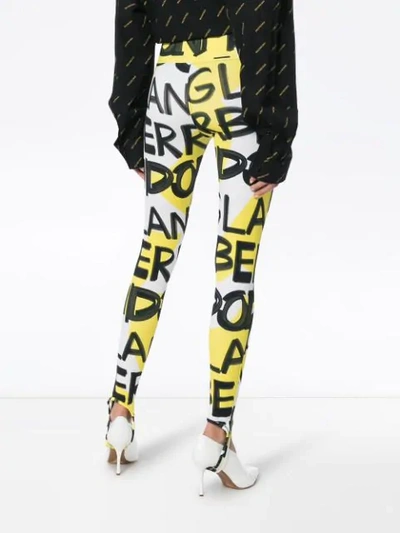 Shop Burberry Graffiti Logo Stirrup Leggings In Yellow