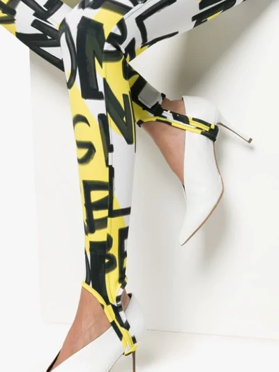 Shop Burberry Graffiti Logo Stirrup Leggings In Yellow