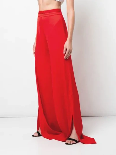 Shop Alexis Roque Slit Trousers In Red