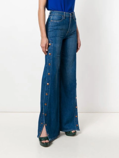 Shop Alice And Olivia Alice+olivia Buttoned Side Flared Jeans - Blue