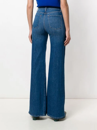 Shop Alice And Olivia Alice+olivia Buttoned Side Flared Jeans - Blue