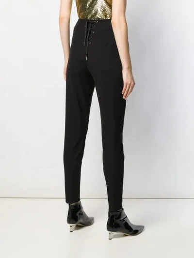 Shop Etro Tapered Trousers In Black