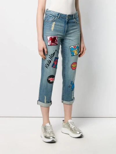 Shop Alice And Olivia X Keith Haring Patch Jeans In Blue