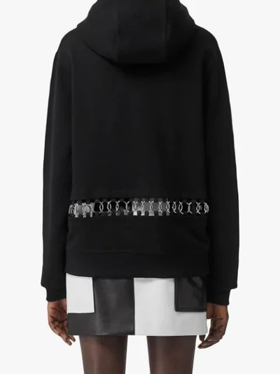 Shop Burberry Ring-pierced Oversized Hoodie In Black