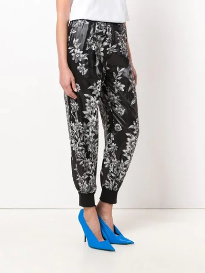 Shop Fendi Floral Tapered Trousers In Black