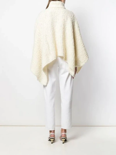 Shop Jacquemus Turtleneck Knitted Poncho In White