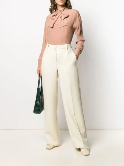 Shop Valentino Tailored Wide Leg Trousers In A03  Bianco