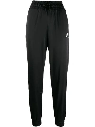 Shop Nike High-waisted Track Pants In Black