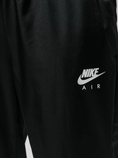 Shop Nike High-waisted Track Pants In Black