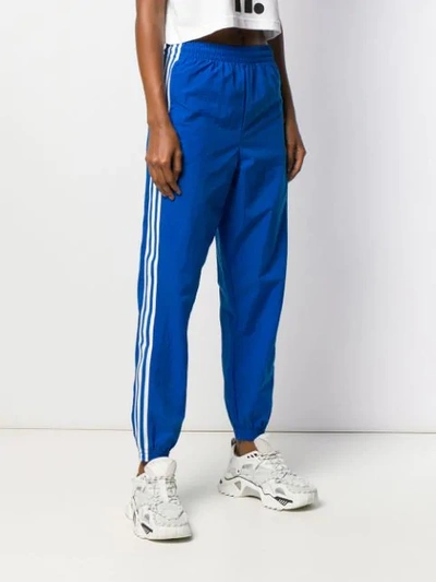 Shop Adidas Originals Stripe Panel Track Trousers In Blue