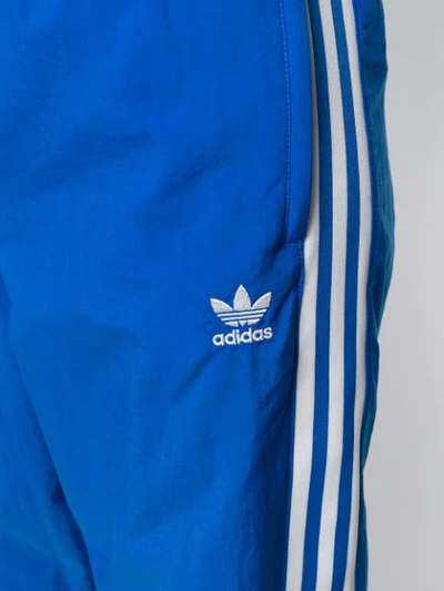 Shop Adidas Originals Stripe Panel Track Trousers In Blue