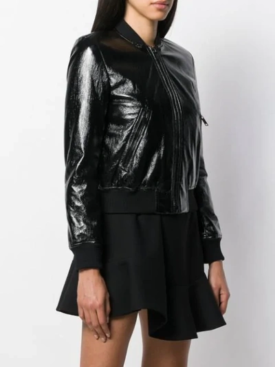 Shop Michael Kors Patent Bomber Jacket In Black