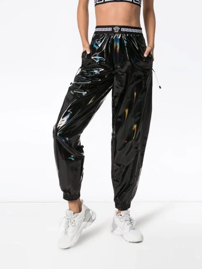 Shop Versace Holographic Track Trousers In Black