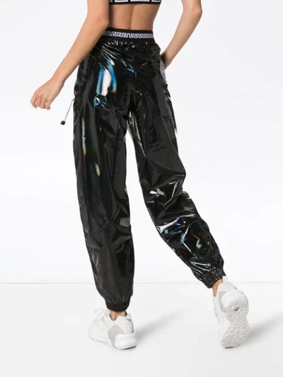 Shop Versace Holographic Track Trousers In Black