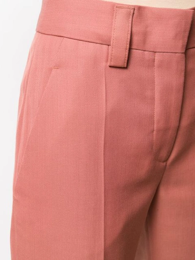 Shop Acne Studios Cropped Trousers In Red