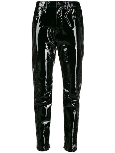 Shop Saint Laurent Patent Leather Trousers In Black