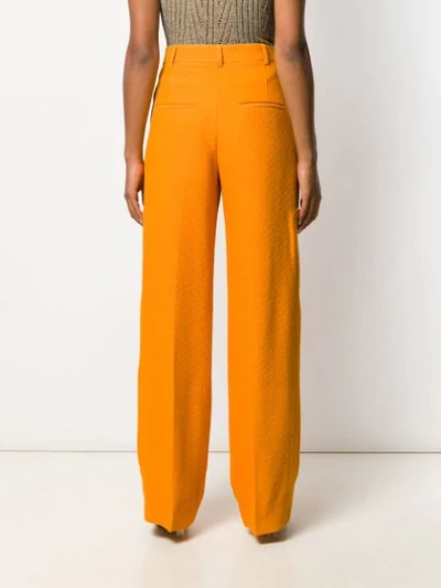 Shop Jacquemus Tailored Wide Leg Trousers In Orange