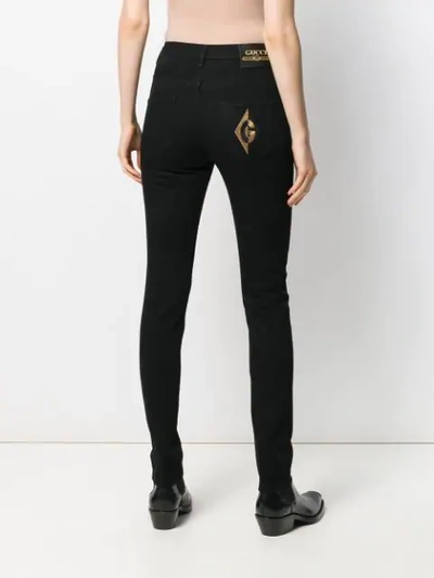 Shop Gucci Logo Patch Skinny Jeans In Black