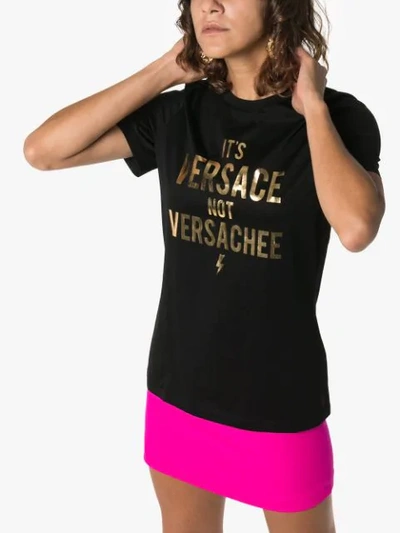 Shop Versace Slogan Cotton T-shirt In Black