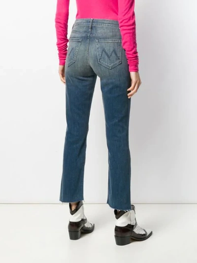 Shop Mother Mid Rise Cropped Jeans In Blue