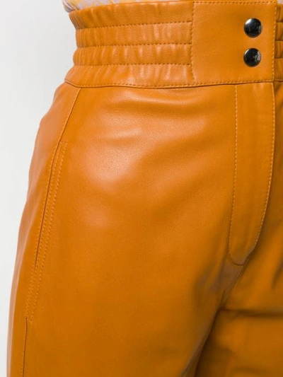 Shop Acne Studios Carrot-shaped Trousers In Brown