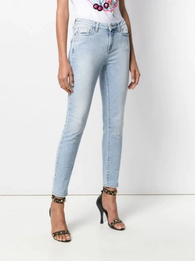 Shop Versace Beaded Skinny Jeans In Blue