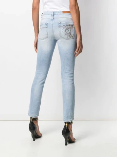 Shop Versace Beaded Skinny Jeans In Blue