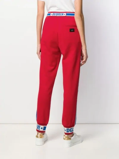 Shop Dolce & Gabbana Dg Queen Track Pants In Red