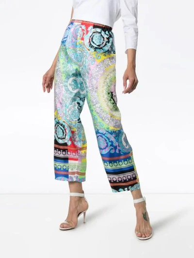 Shop Versace Wild Baroque Print Trousers In Blue