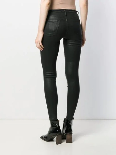 Shop 7 For All Mankind Low Rise Coated Skinny Trousers In Black