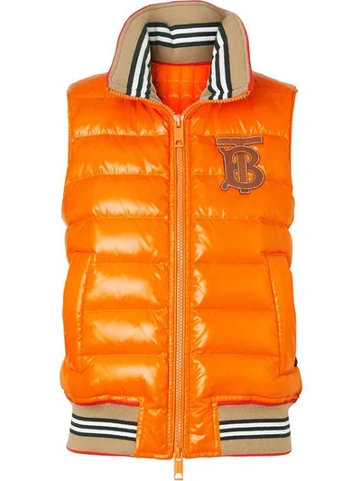 Shop Burberry Icon Stripe Detail Down-filled Puffer Gilet In Orange