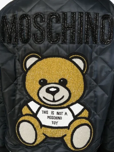 Shop Moschino Teddy Quilted Bomber Jacket In Black