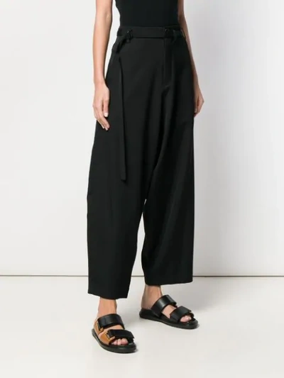 Shop Yohji Yamamoto Oversized Trousers In Black