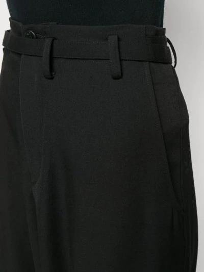 Shop Yohji Yamamoto Oversized Trousers In Black