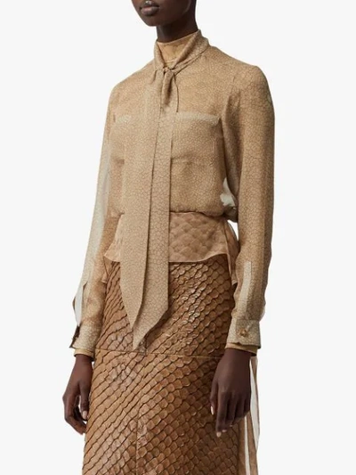 Shop Burberry Fish-scale Print Silk Oversized Pussy-bow Blouse In Neutrals
