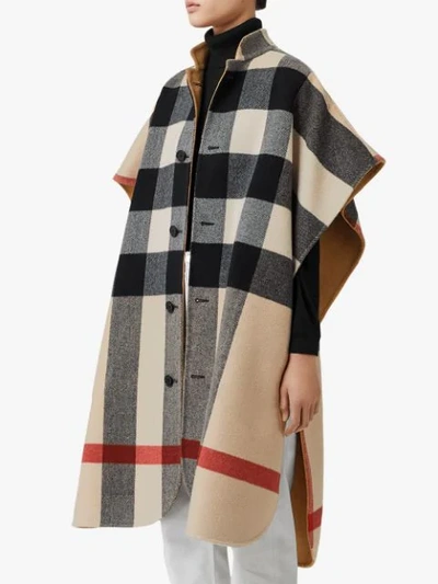 Shop Burberry Reversible Check Wool Blend Poncho In Brown
