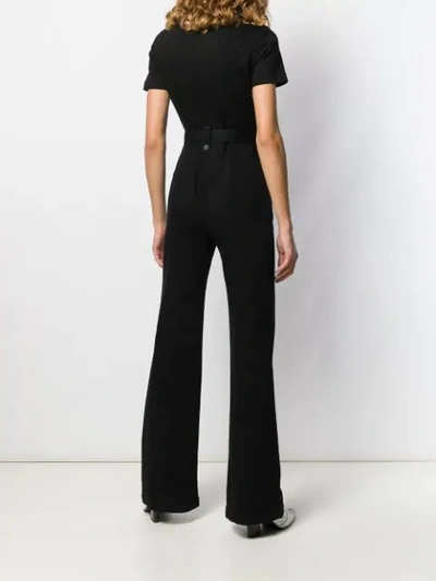 Shop Alice And Olivia Flared Jumpsuit In Black