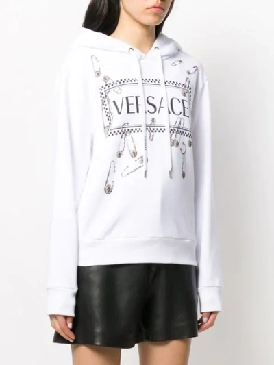 Shop Versace Logo Safety Pin Hoodie In White